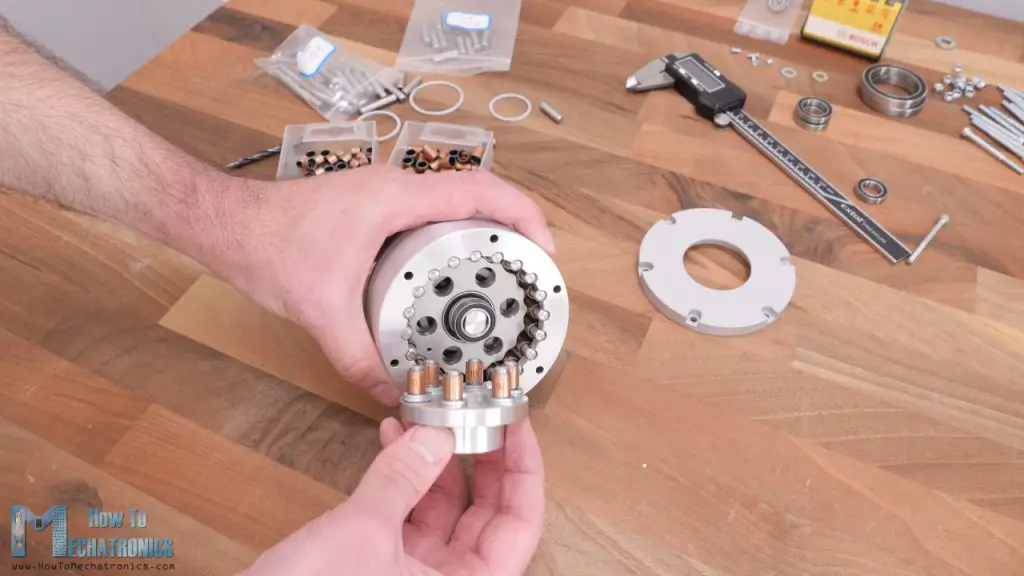 Inserting the output shaft into the cycloidal disks holes