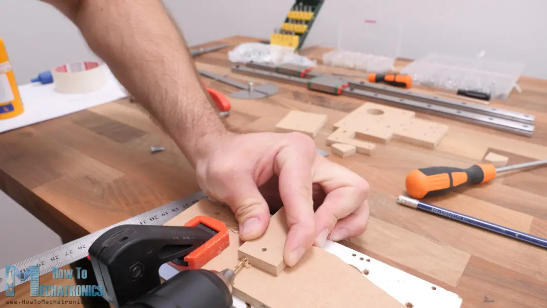 pre-drilling the MDF board with 2mm drill