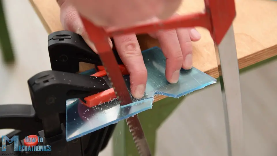 Shaping acrylic using a metal hand saw