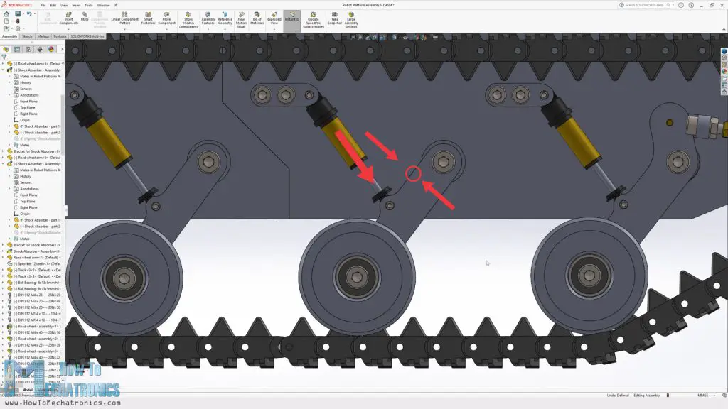 Suspension mechanism for the tank